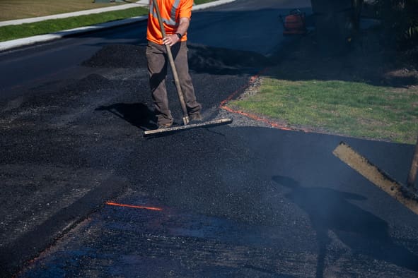 paving contractor at work